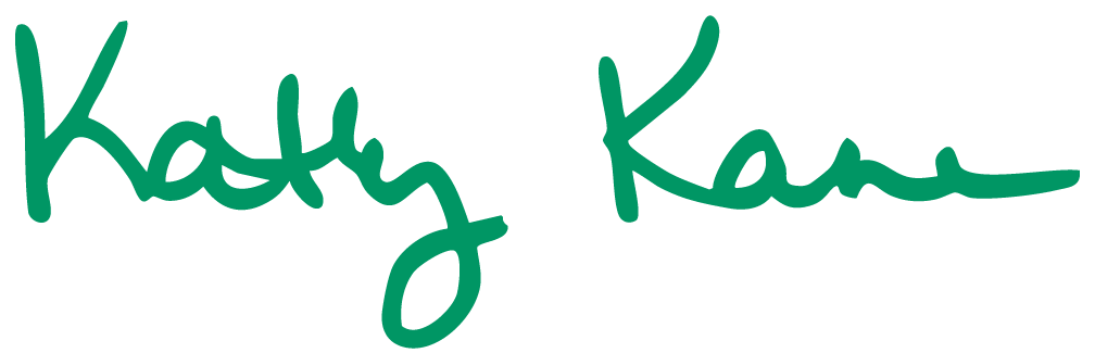 Green handwritten signature that reads "Kathy Kane" on a white background.
